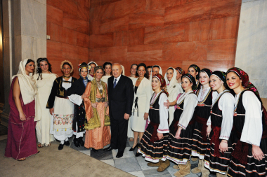Karolos Papoulias, President of the Hellenic Republic at the time, with the President of the LtE and members of the Folk Dance Group. Academy of Athens, 16th March 2011