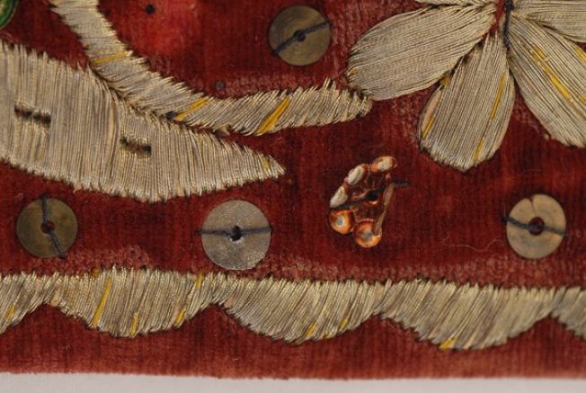 Detail of the decoration, spangles and stars, gold thread