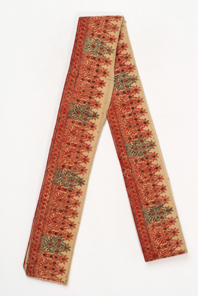 Embroidered band of the fabric