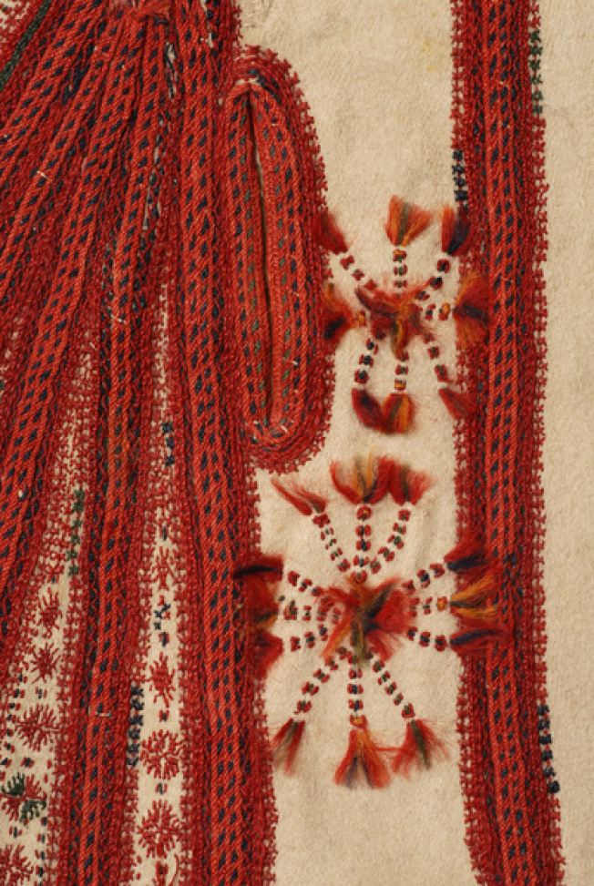 Detail of the decoration with loutres and klostaria at the pocket