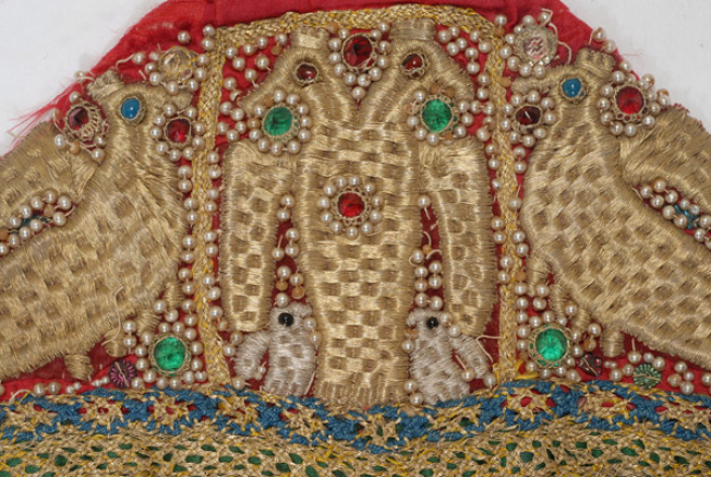 Detail of the decoration with syrmakesiko (wiry) embroidery and applique elements
