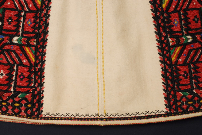 Details of the embroidered squares and side decoration
