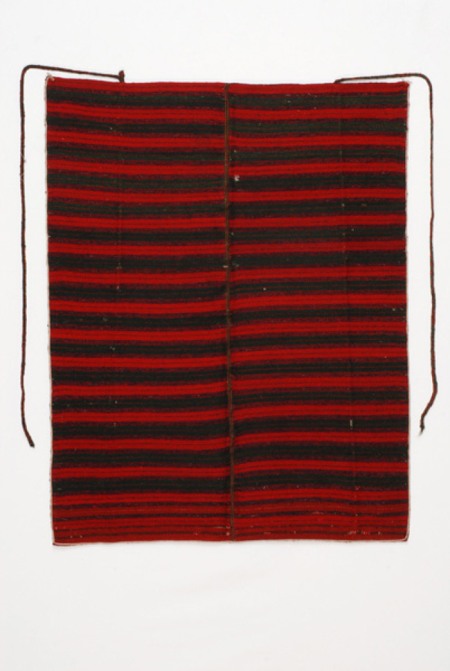 Pileno, woven, woollen apron with fringed edges