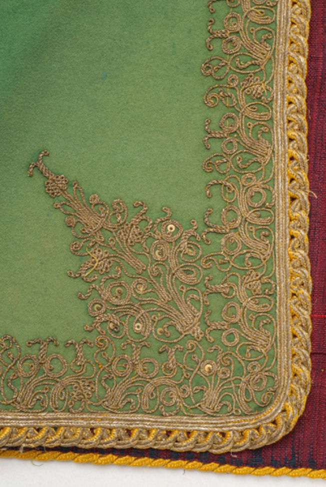 Detail of terzidikos (gold tailored) embroidery at the corner of the front panel