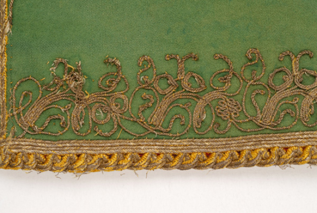 Detail of terzidikos (gold tailored) embroidery at the sleeve edge