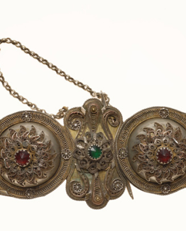 Gilded buckle with wiry multi-leafed rosettes and coloured glass stones
