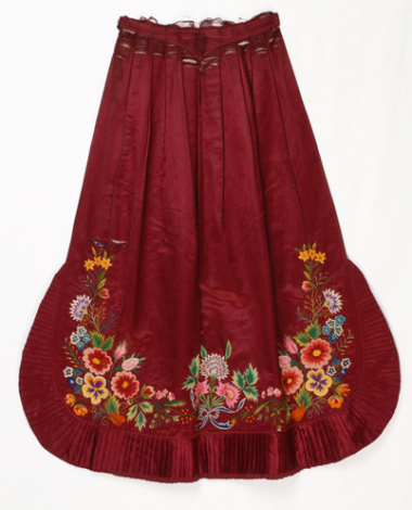 Satin apron in bright crimson colour, embroidered with multicoloured silk threads 
