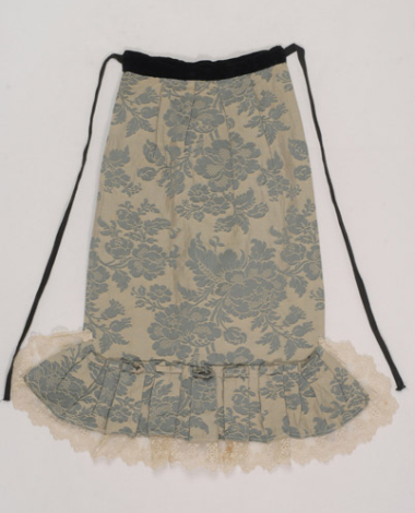 Festive apron made of cotton brocaded fabric