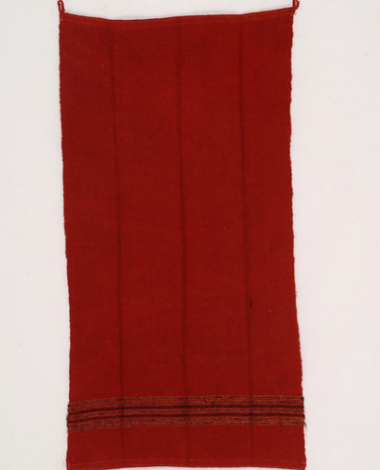 Handwoven, red wool apron with embellished stripes at its lower part