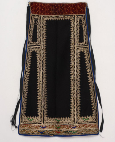 Karagounian apron made of black felt, embroidered with white and gold cordons along with a few outrades (silk braids) 
