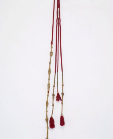 Peskoulia, a kind of ornament made of a silk cord wrapped in gold thread that ends in tassels