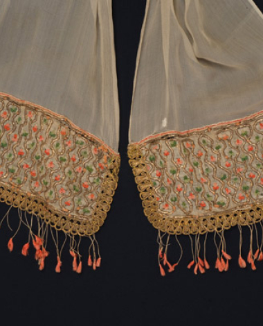 Corner of a bolia from Psara with rich embroidery at the ends, silk threads and metal blades