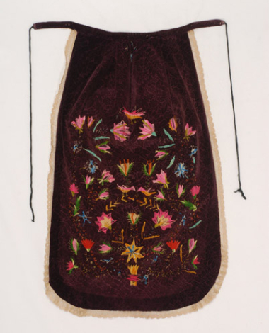 Newer version of a velvet apron with silk embroidery taken from the frames