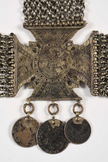 Detail of a ornament worn on the chest, with an image of St George the Dragon Slayer. CMLE, Accession No. 15577. Donated by Lefteris Drandakis. Photo: Studio Kominis.