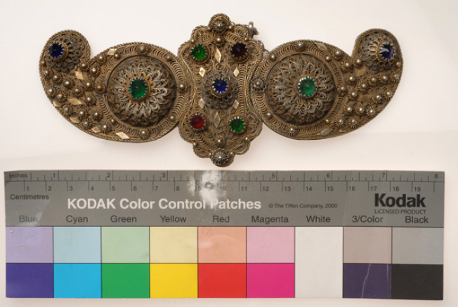 Gold-plated buckle with multi-panelled filigree rosettes and variegated glass stones