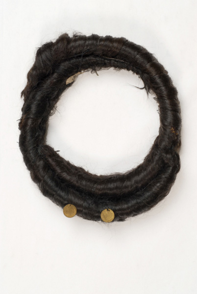 Perouklia or kosidia, double thick braid (kosa) in ring shape. Older type of head dress accessory from Metsovo