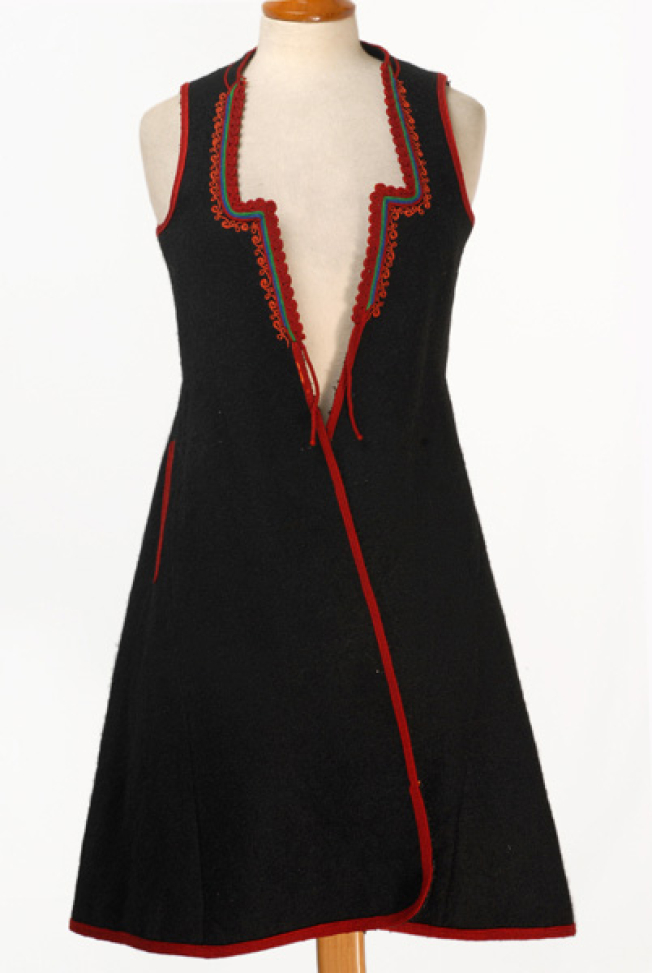 Woollen sigouna, sleeveless overcoat made of black saddle blanket decorated with colourful, woollen cordons