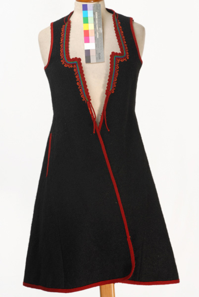 Woollen sigouna, sleeveless overcoat made of black saddle blanket decorated with colourful, woollen cordons
