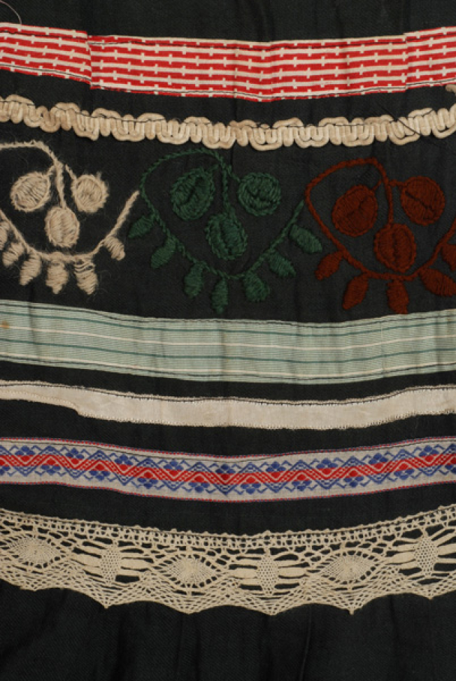 Embroidery framed by applique decoration