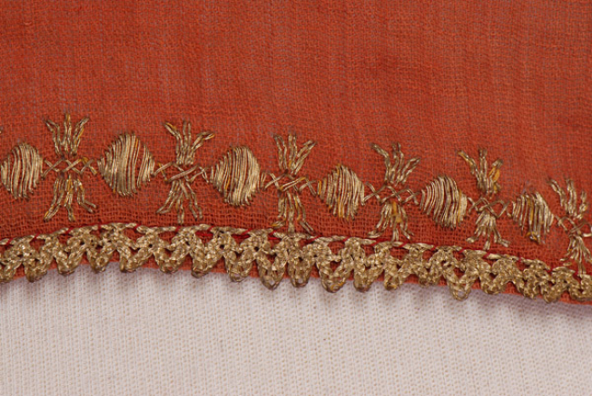 Border, detail of the decorative motif and the lace