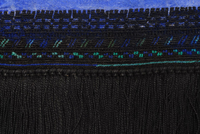 Border, detail of the decoration with small coloured stylized motifs