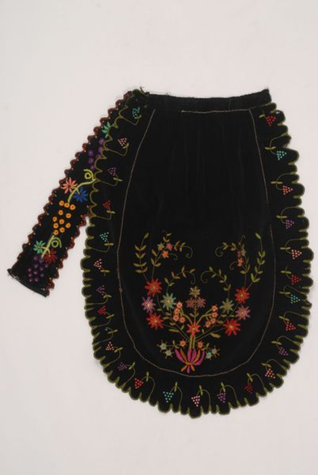 Black velvet apron embroidered with colourful silk