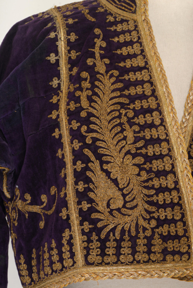 Front panel, detail of the gold embroidered decoration 