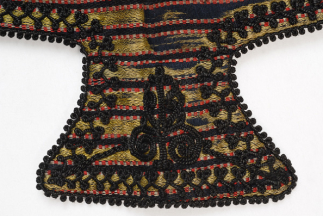 Limba (edge of the sleeve), detail of the decoration with black silk cordon 