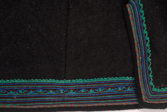 Detail of the applique decoration at the border with outres