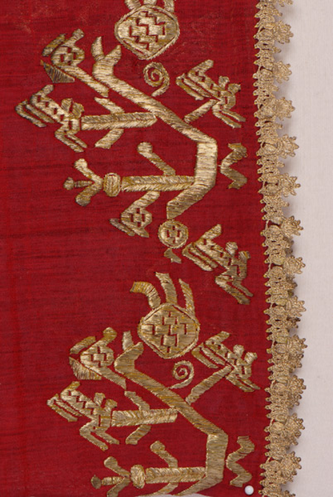 Sleeve, detail of the decorative motif and the lace