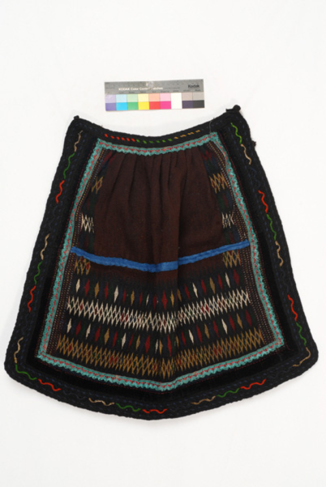 Poal, woollen thick wooven apron with embellished geometrical motifs and applique elements