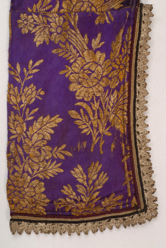 Detail of the silk brocaded fabric at the outer side of the sleeves