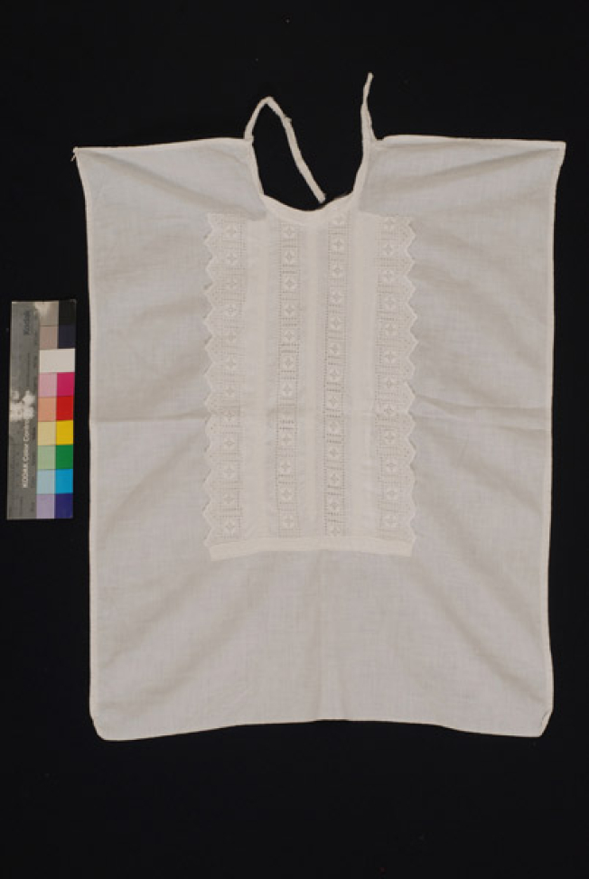 Plastron made of calico, ornamented with applique white embroidery
