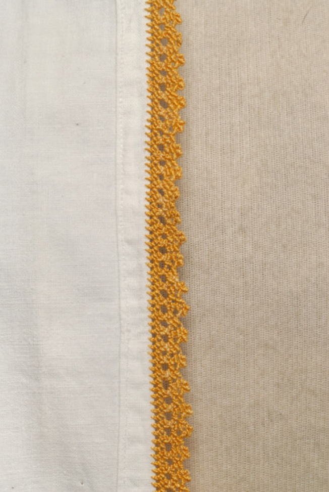 Detail of the decoration, dontitsi, lace at the opening of the laimaria