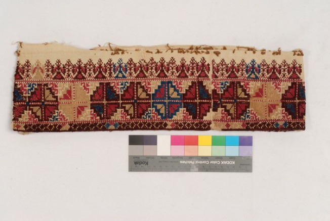 Part of the handwoven, cotton chemise border, embroidered with colourful silk threads