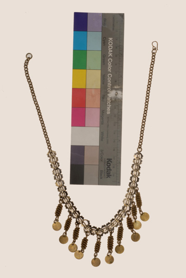 Choker with suspended elements (massouria) from spiral gilt wires. Small gilded coins complete the composition