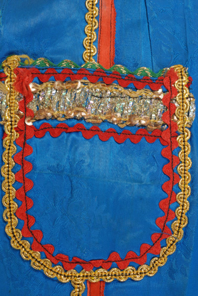 Upper right, small applique pocket
