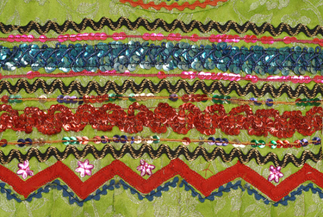 Detail of applique decoration, shoulder 