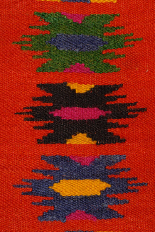 Detail of the decoration in the centre of the apron: tsaganaioi