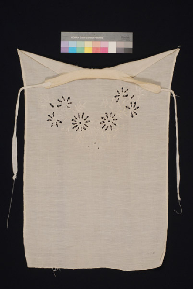 Trachilia, pectoral piece of fabric with white embroidery 