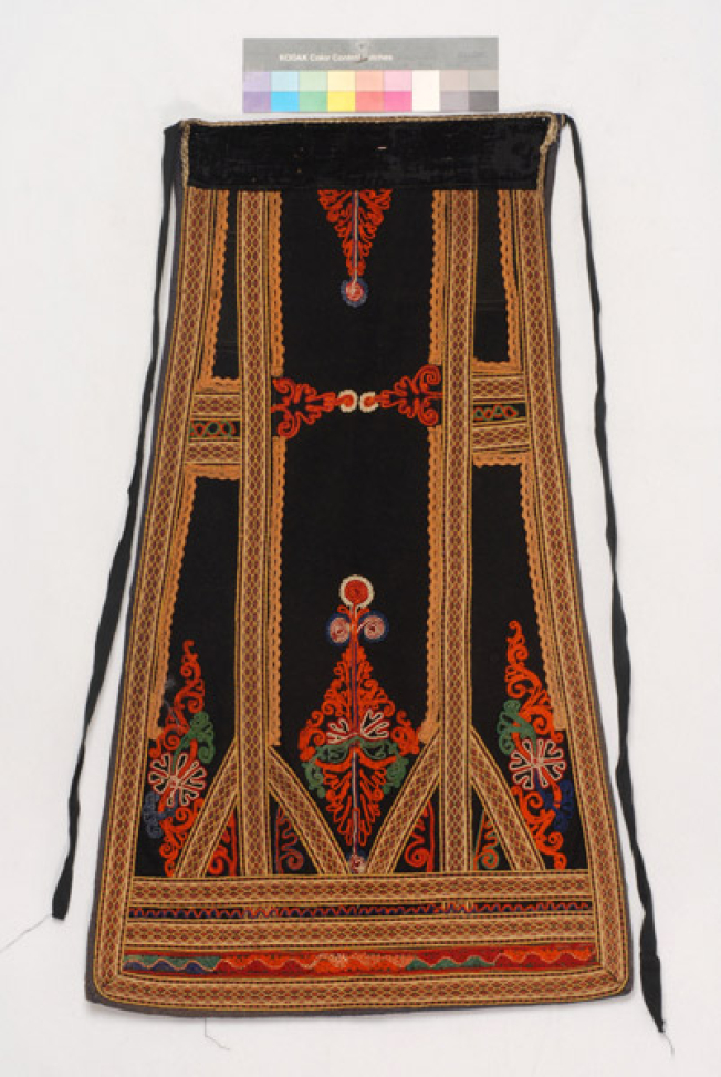 Karagounian outradenia apron made of black felt, ornamented with woven bought bands and zig-zag braids 