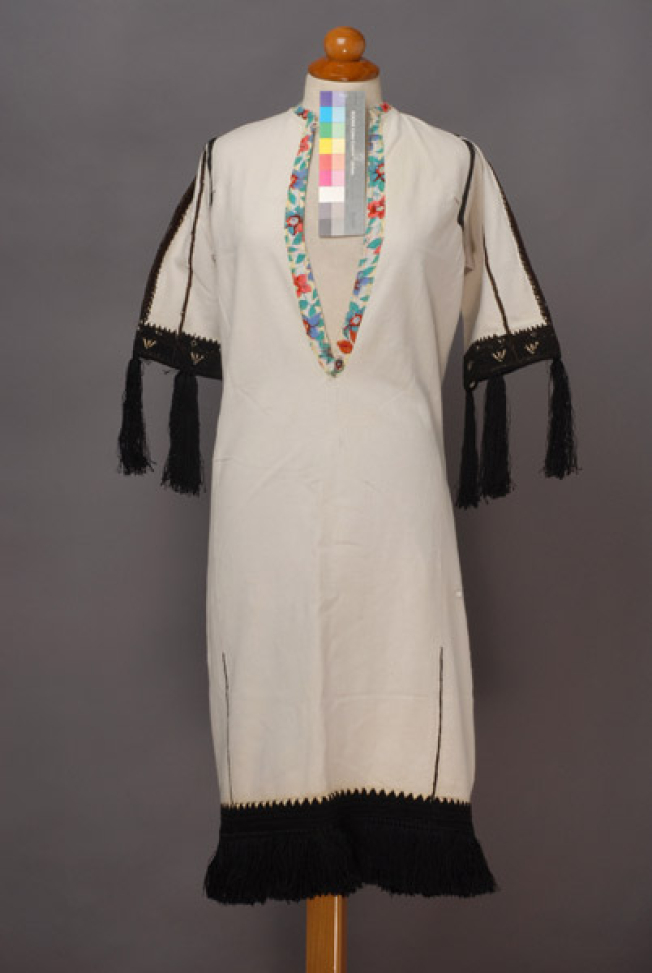 White cotton chemise, embroidered with black woollen threads and white tiriplisia thread