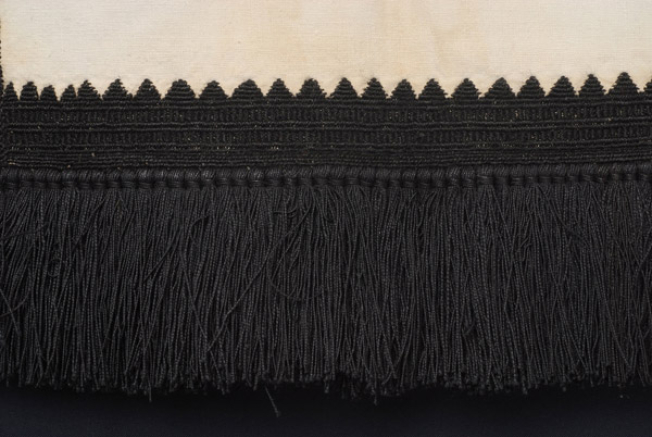 Border, detail of the decoration with koukoulia vitsisia, stromena with stavrovoulia and full of horizontal vitses