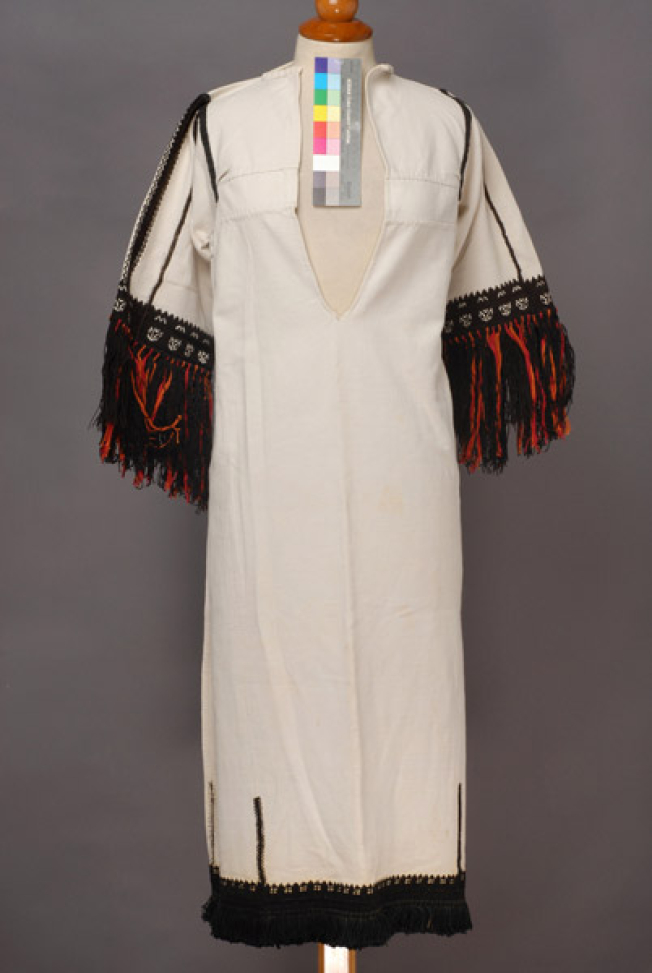 White cotton chemise, embroidered with black woollen threads and white tiriplisia thread