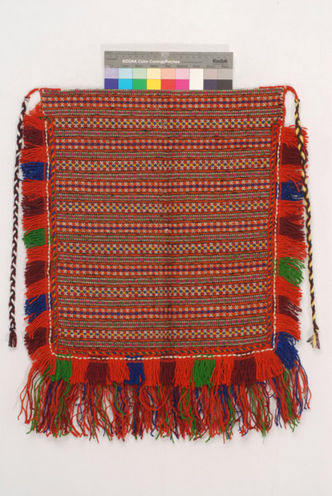 Woollen woven apron with embellished linear decoration 