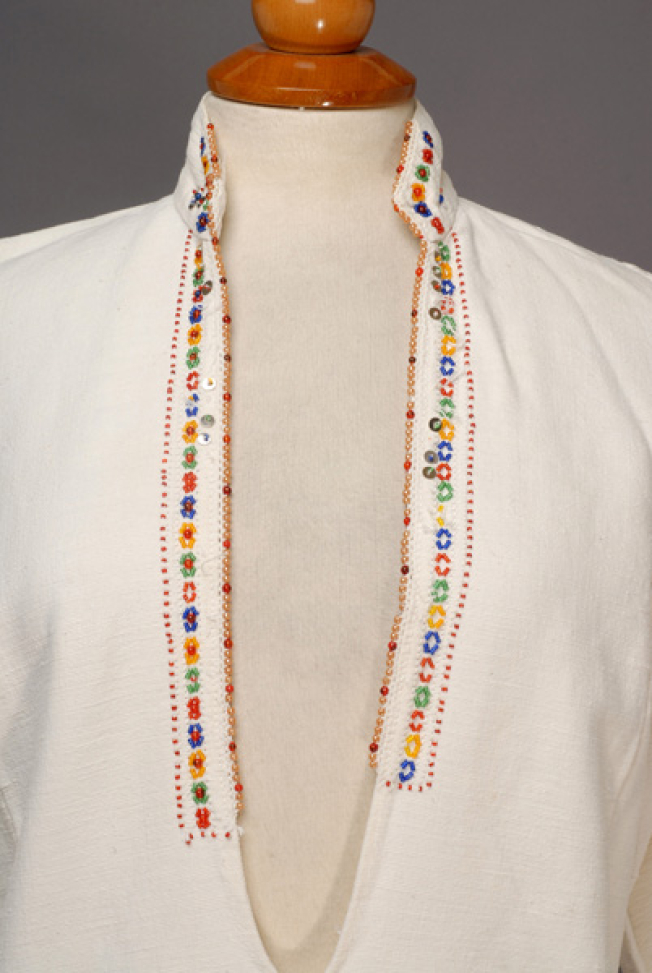 Plastron, detail of the applique decoration