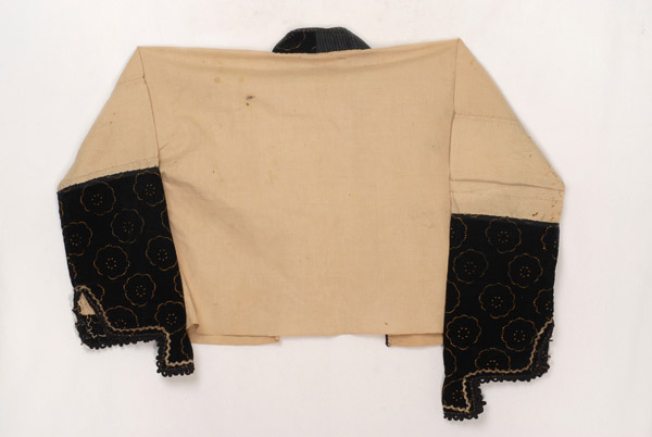 Βαμβακερός μπούστος ντυμένος με μαύρο βελούδινο ύφασμα, πίσω όψη