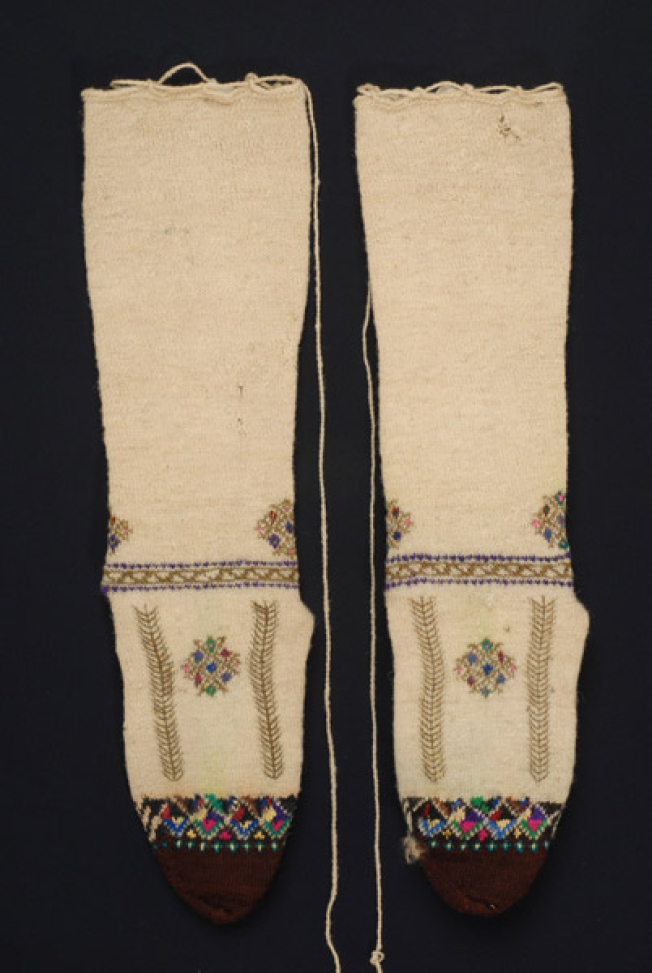 Stockings with rich decoration with mytoftera and ploumia (finery)