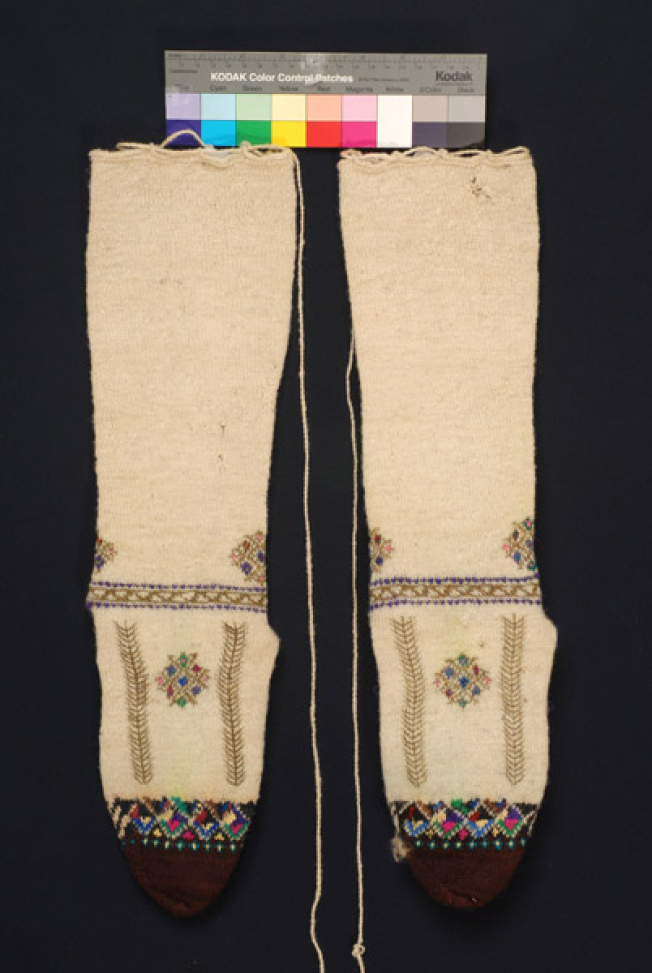 Stockings with rich decoration with mytoftera and ploumia (finery)