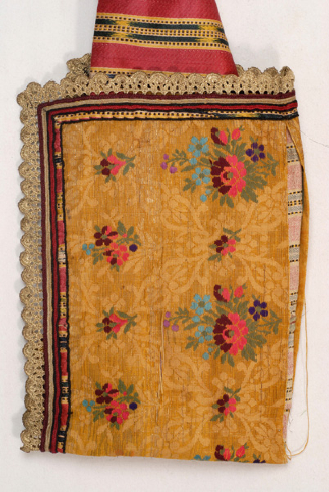 Detail of the silk brocaded fabric at the inner side of the sleeves